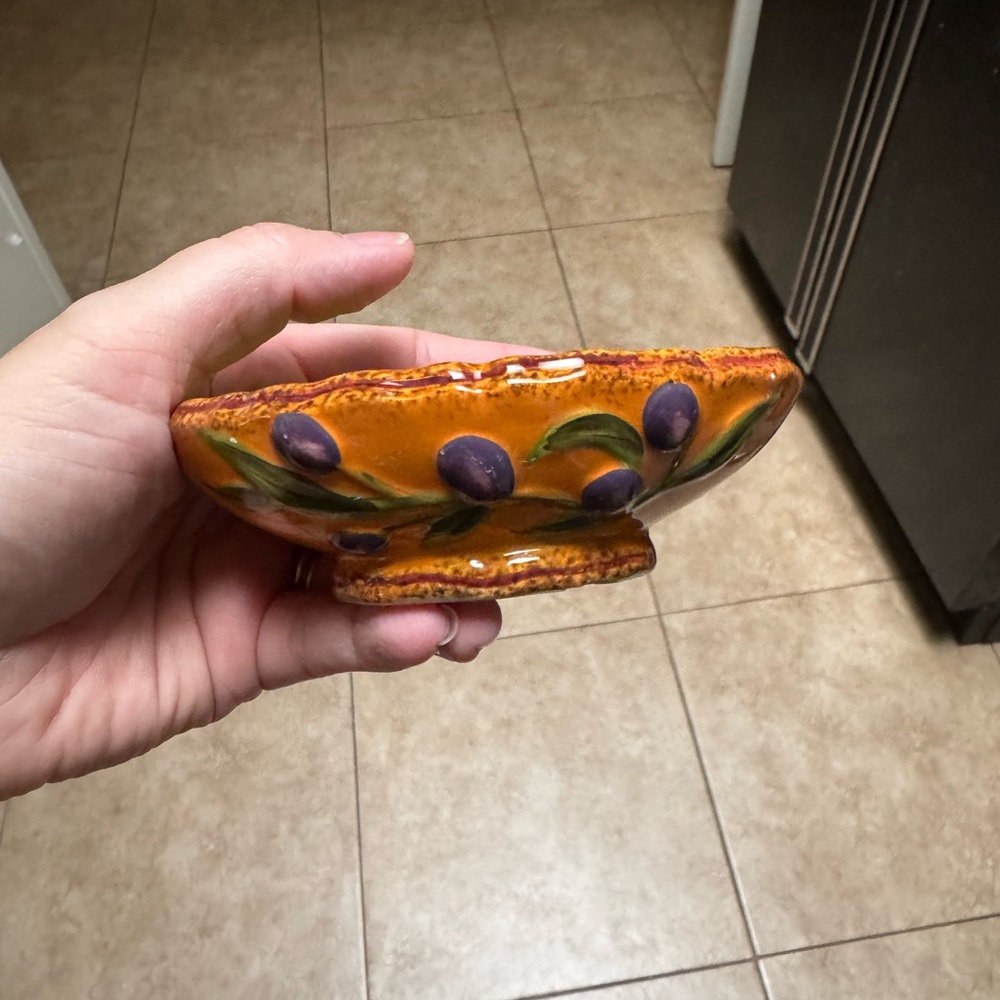 Vibrant Orange Ceramic Bowl with Olive Design